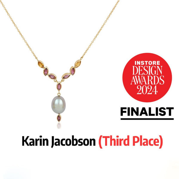 gray pearl necklace on gold chain with marquise-shaped citrine, pink tourmaline and rhodolite garnets, which was Instore design awards finalist