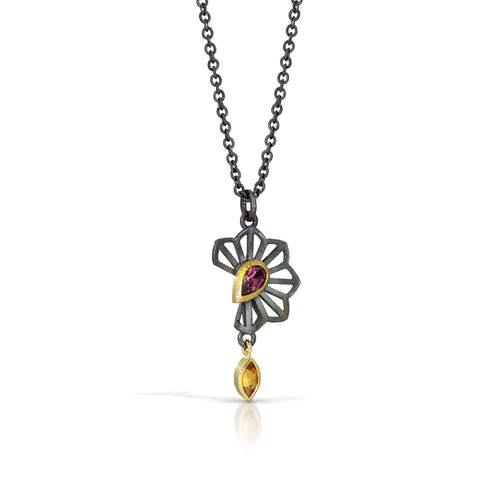 Origami-folded oxidized sterling silver necklace with rhodolite garnet and citrine set in 18k yellow gold