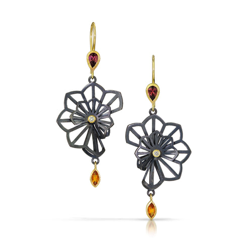 Origami sculpted oxidized sterling silver earrings with recycled diamond, pear-cut rhodolite garnet, and marquise-cut citrine set in 18k yellow gold.